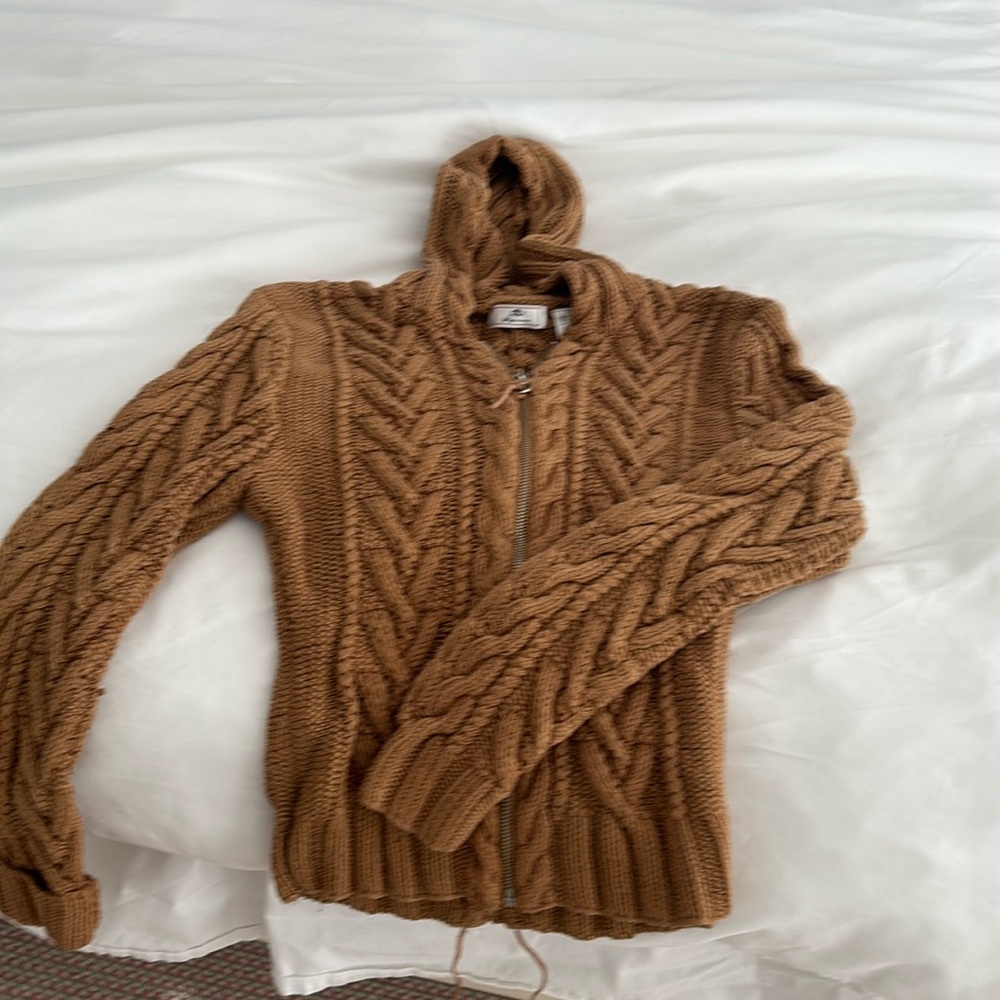Knit sweater with zipper and hood.  Warm nice to layer a top